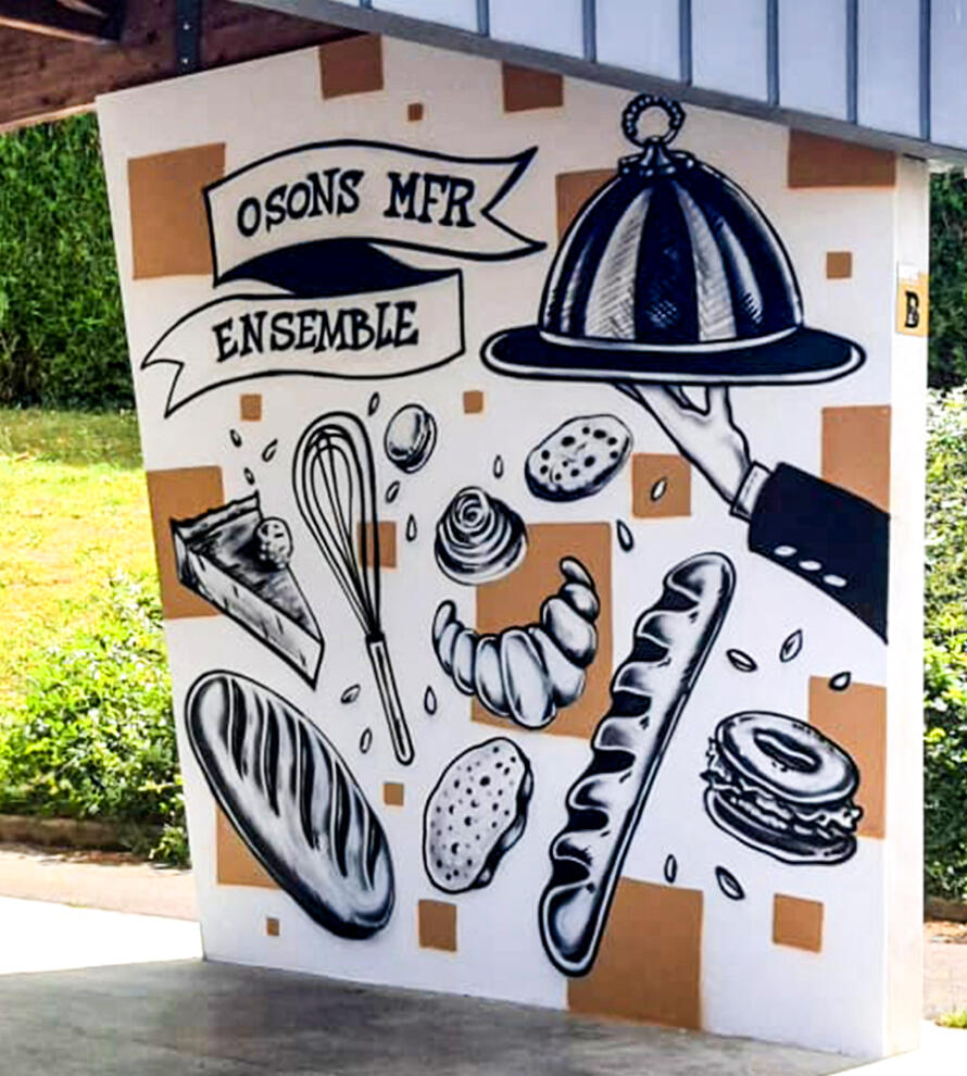 Décoration extérieure : fresque graffiti street-art sous le préau d’une école hôtelière en Vendée
