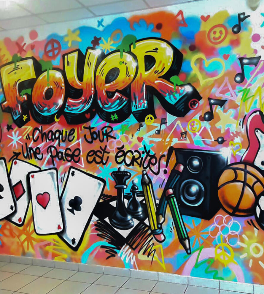 Décoration intérieure : fresque graffiti street-art pour le foyer d'un internat
