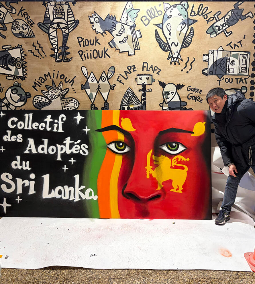 Décoration graffiti enseigne avec logo pour une association lors d'un festival pour le collectif des adoptés du Sri lanka